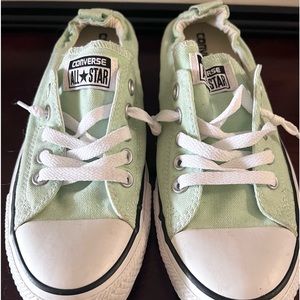 Converse women’s light green slip on sneakers